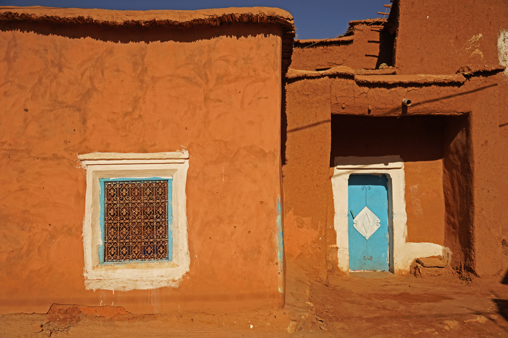 Detail,Of,Traditional,Berber,Clay,Made,House,With,Blue,Doors